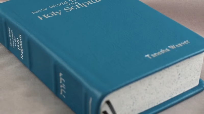 Hardcover book with a solid blue cover and spine, representing paperback and hardcover book cover sizes